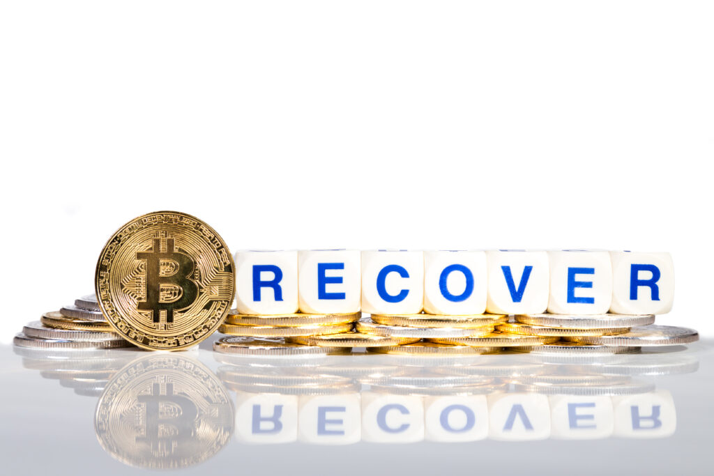 Conceptual cryptocurrency bitcoin with the word Recover on white background