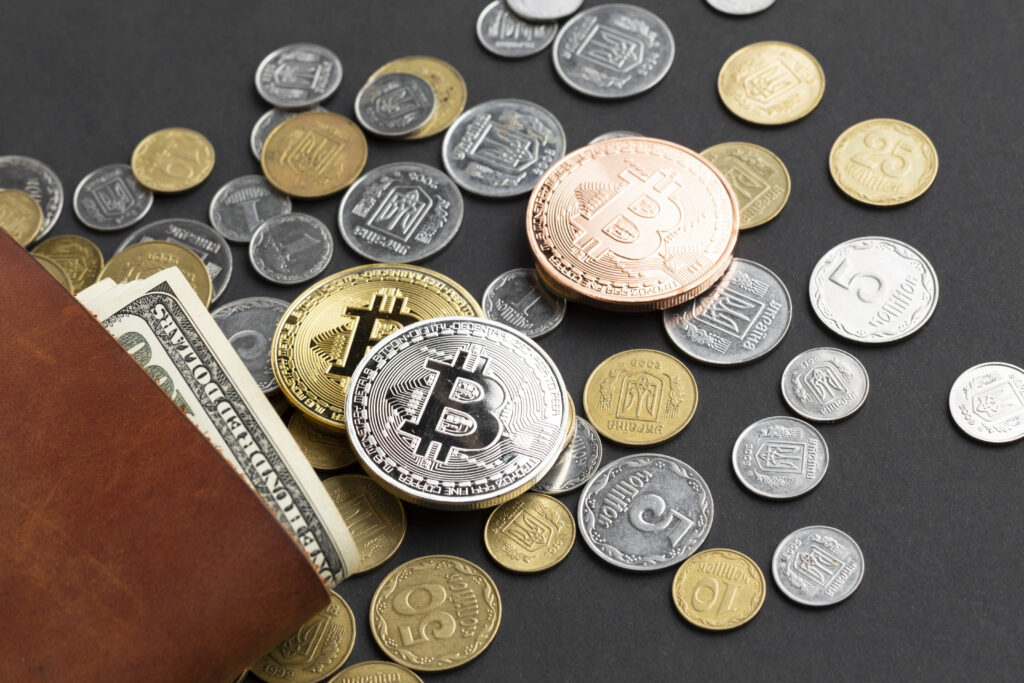 Cryptocurrencies near a wallet