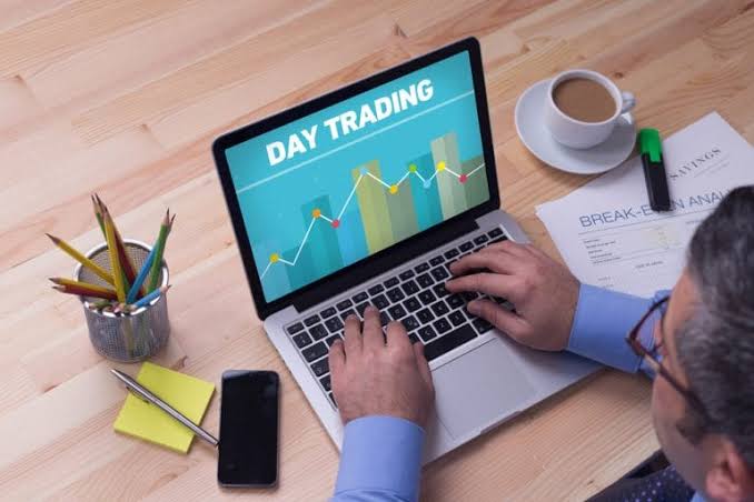 Day trader analyzing charts on a laptop
Source: Google