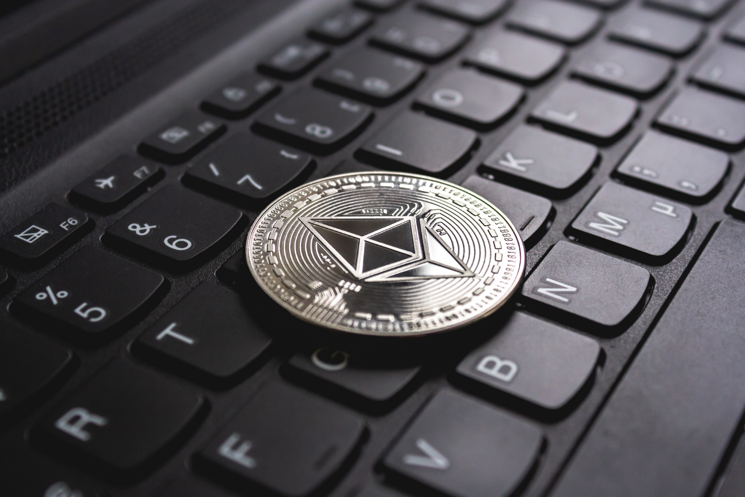 ethereum coin on keyboard