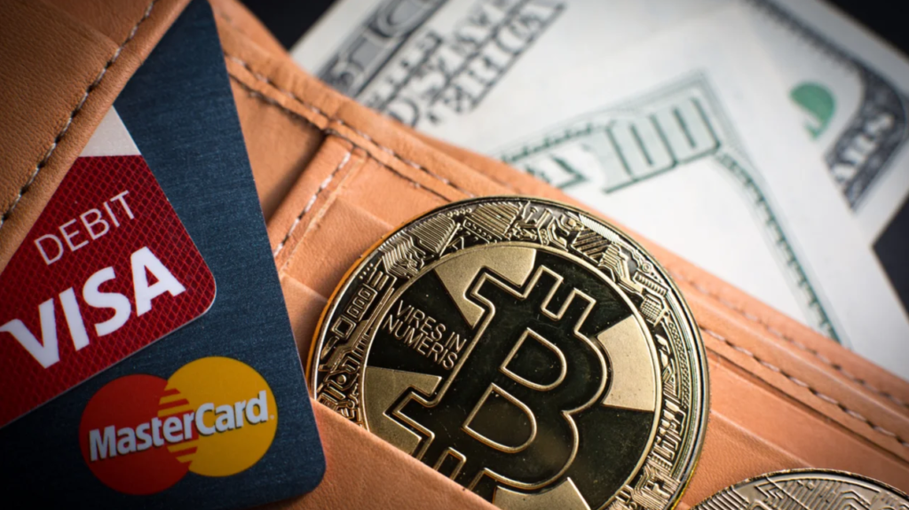 クレジットカード、暗号通貨コイン、ドル紙幣は暗号通貨での支払いを意味する