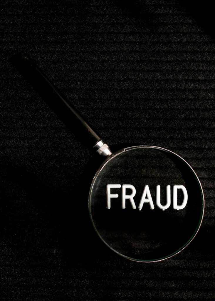 Image depicting a magnifying mirror trying to search out fraud
