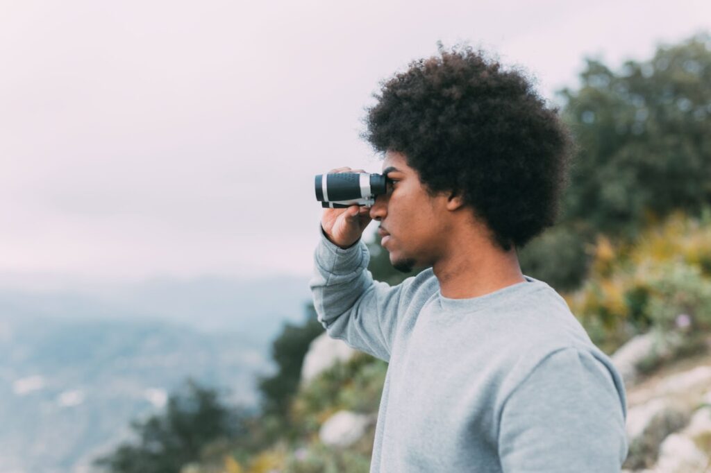 Image showing a man looking at a far distance