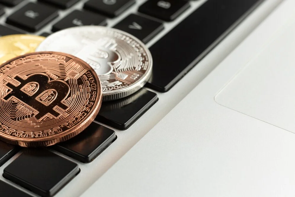 Crypto coins on keyboard