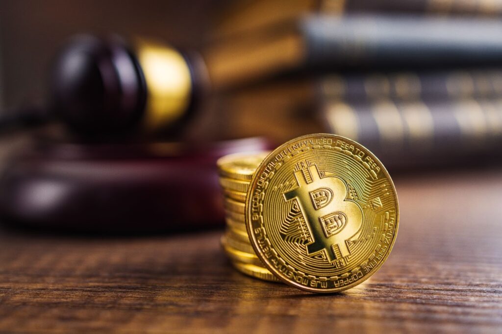 Golden coins and judge gavel.