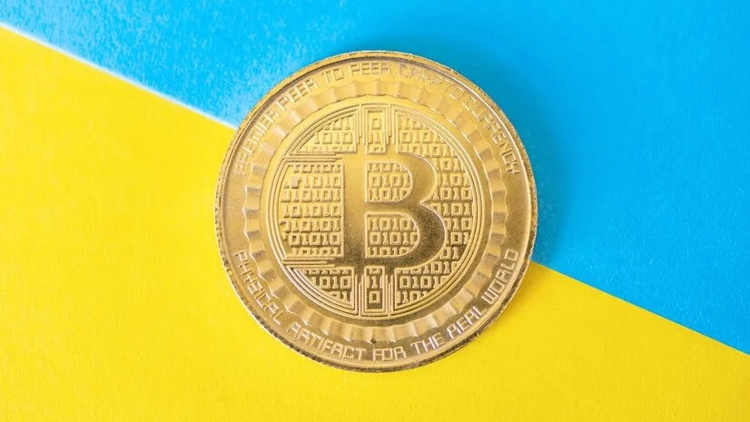 Bitcoin with blue and yellow background