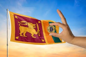 Hand placing bitcoin on sri lanka flag
