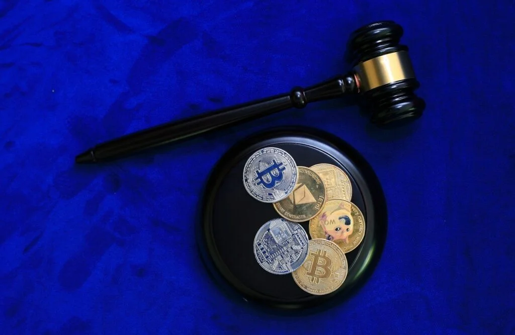 A shot of Bitcoins and a gavel