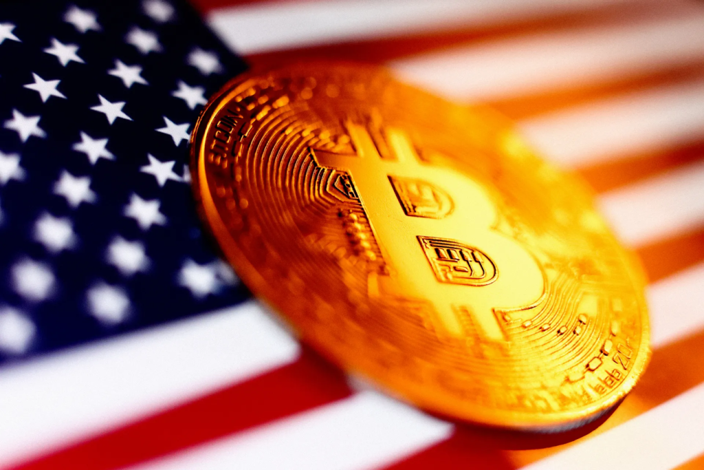 Shiny bitcoin on a USA flag layer