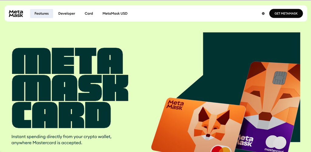 Metamask web page displays Metamask card in orange color with web contents and action buttons